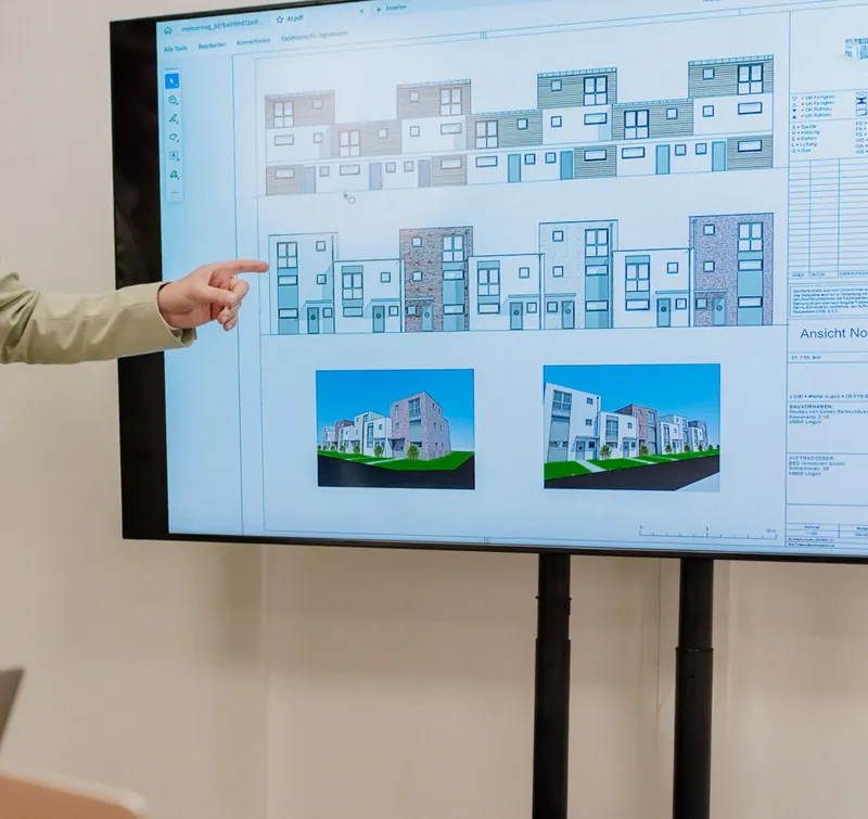 Präsentation eines Neubauprojekts mit Reihenhäusern im Büro von Geradehaus